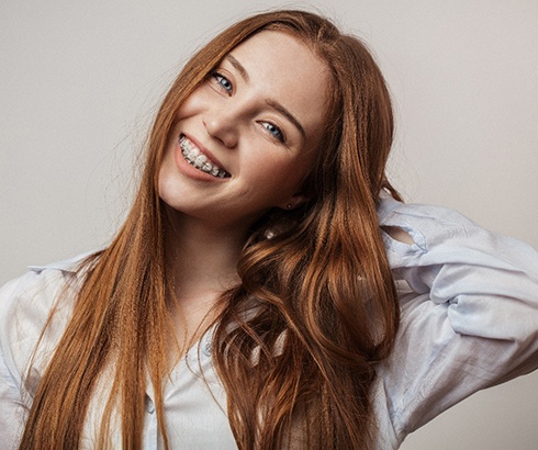 Smiling woman with braces