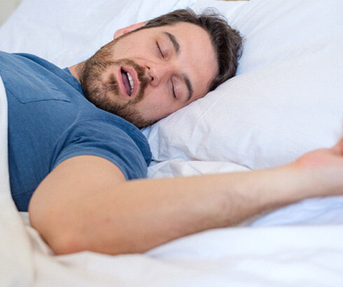 man sleeping with his motuh open